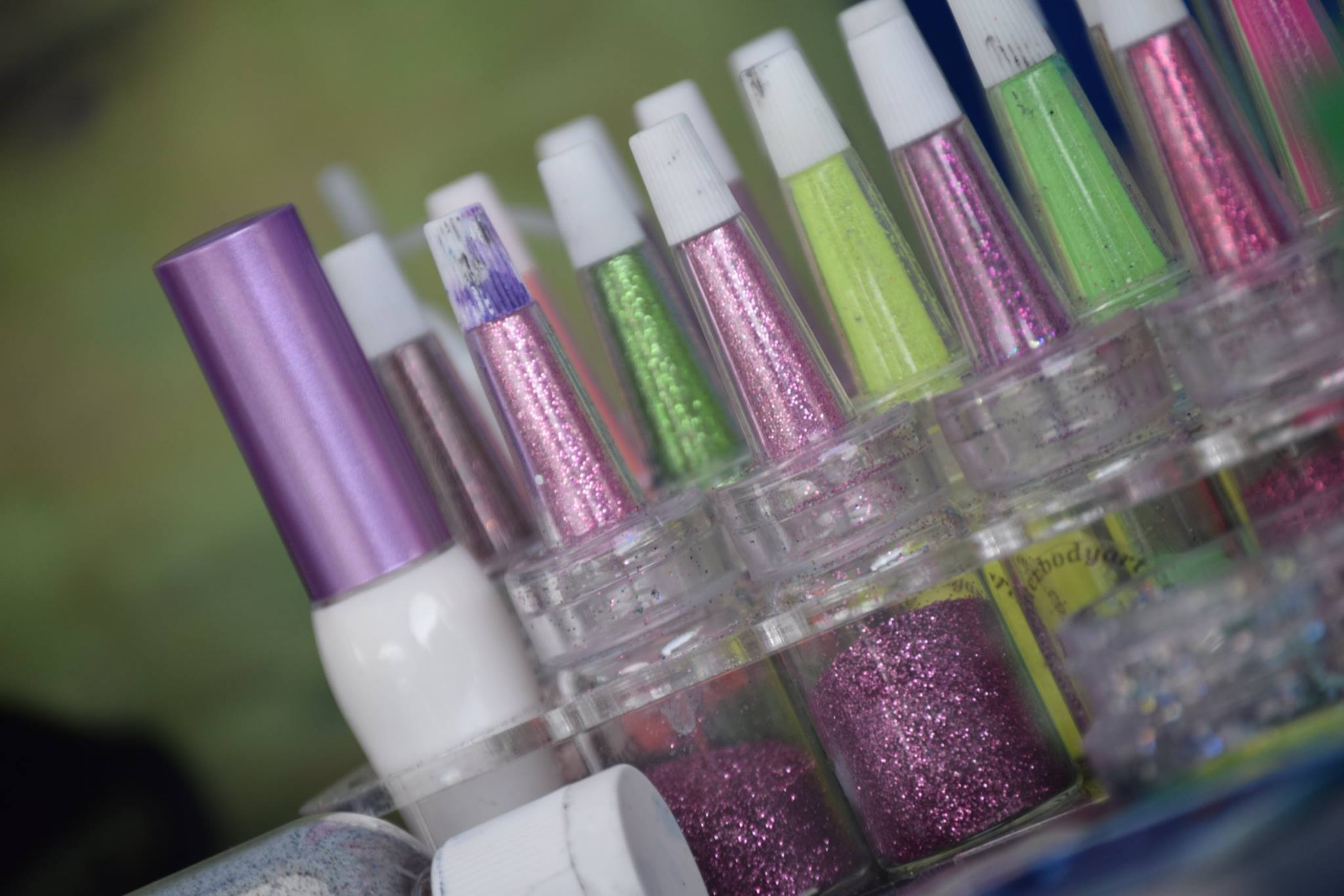 bottles of glitter for glitter tattoo's